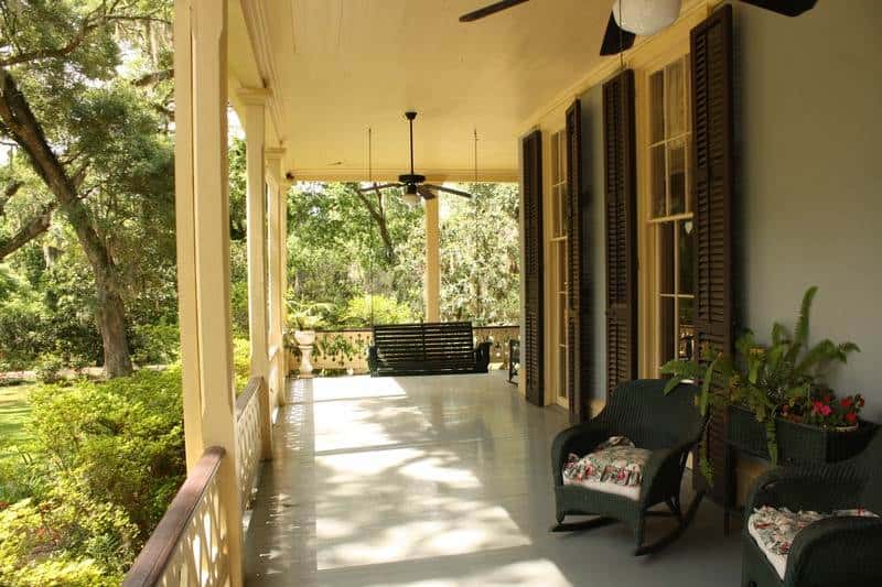 porch with furniture - summer home maintenance